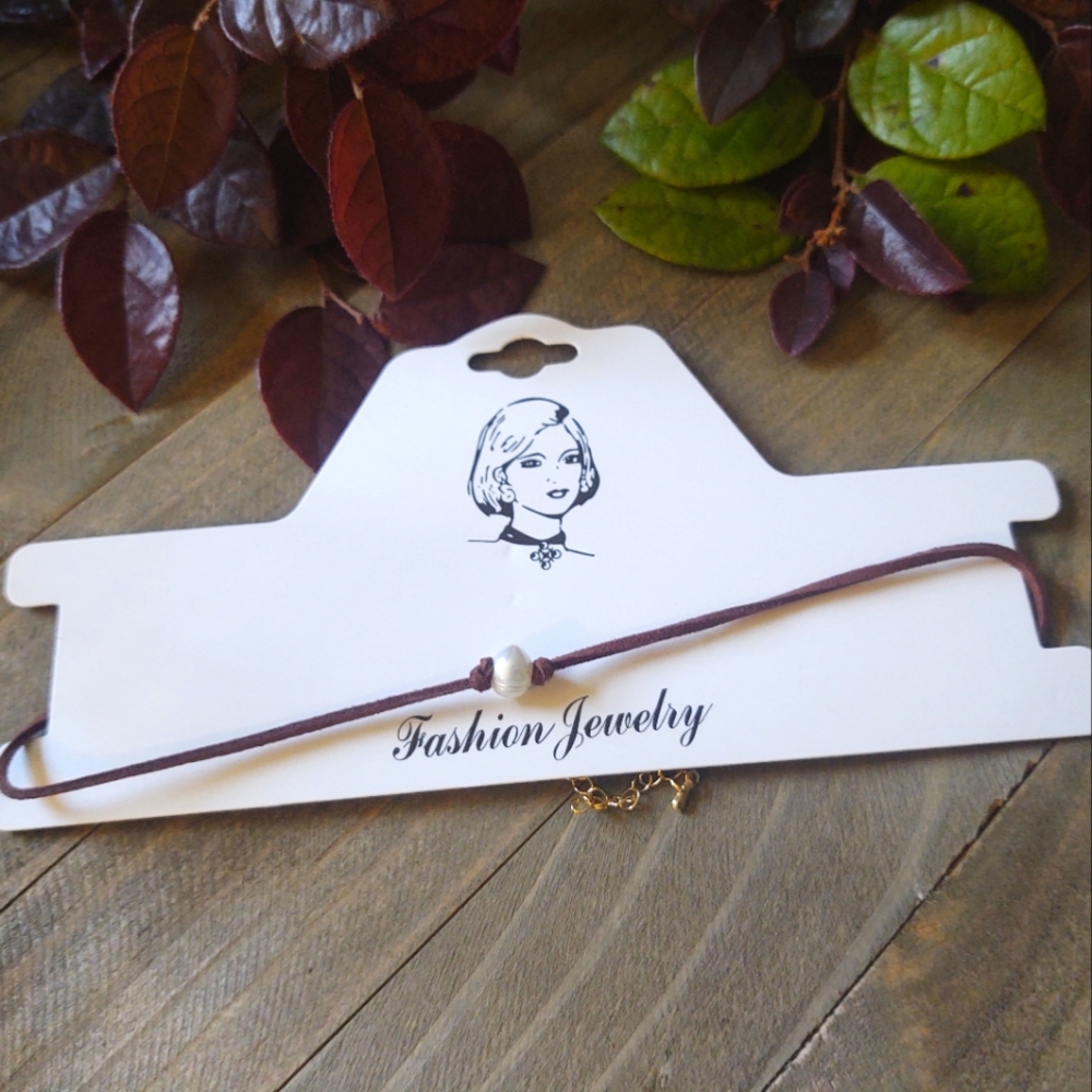 Cultured pearl suede leatherette choker necklace.